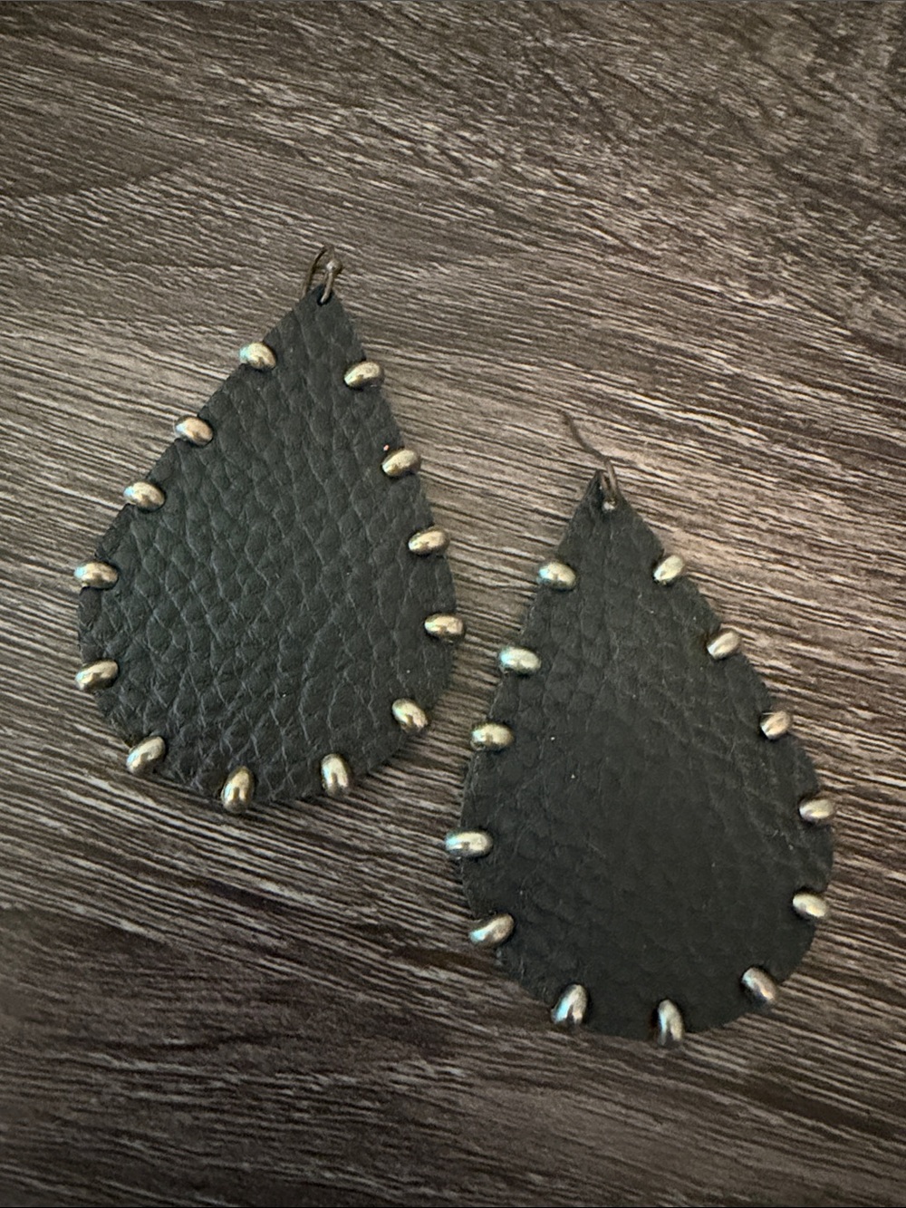 Handcrafted Black Teardrop Leather Earrings with Silver Accents
